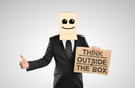 businessman with a happy box on headの写真素材