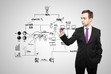 man drawing global business conceptの写真素材