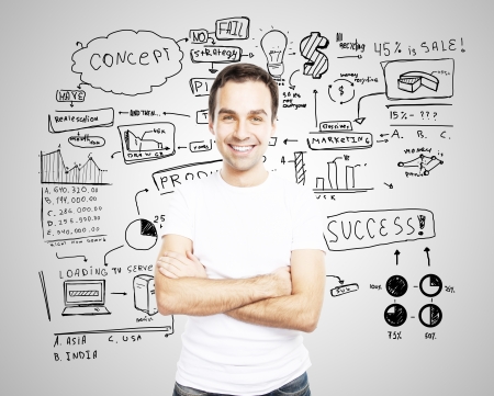 smiling man in wite tshirt and business concept backgroundの写真素材