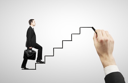 businessman walking on drawing stairsの写真素材