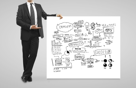 businessman pointing at  business conceptの写真素材