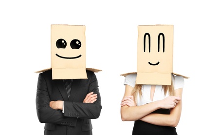 businessman and woman with smiling box on headの写真素材