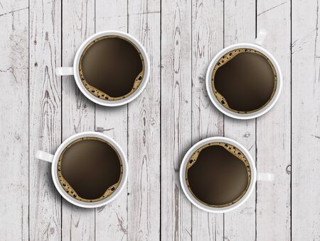 four cups of coffee on wooden tableの写真素材