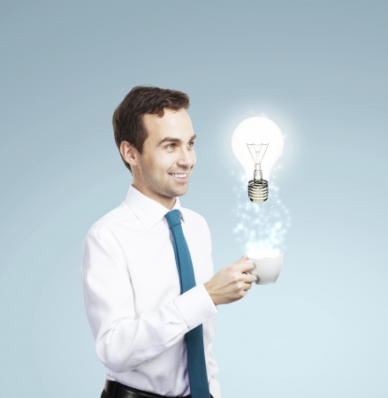 businessman with a cup of coffee, idea conceptの写真素材