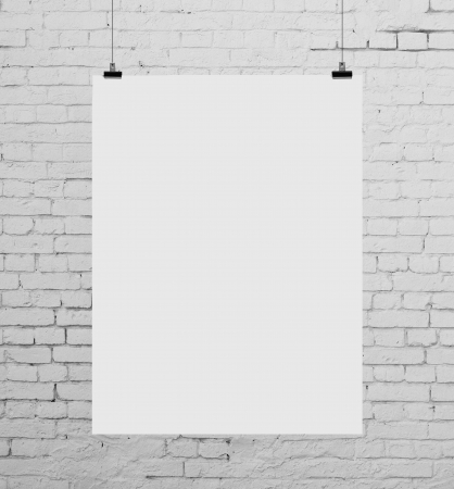 brick wall with white posterの写真素材