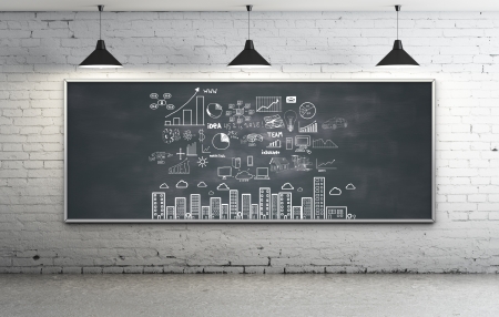 business strategy on blackboard in roomの写真素材