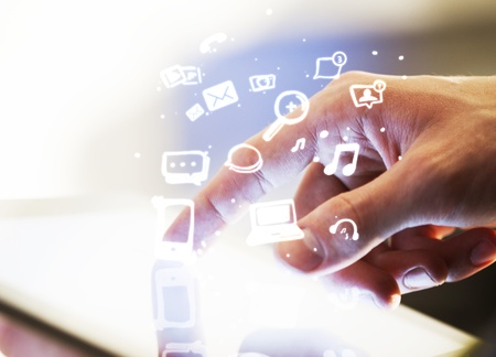 hand touching digital tablet, social media conceptの写真素材