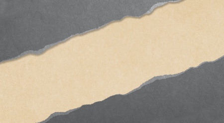 gray torn paper with yellow backgroundの写真素材