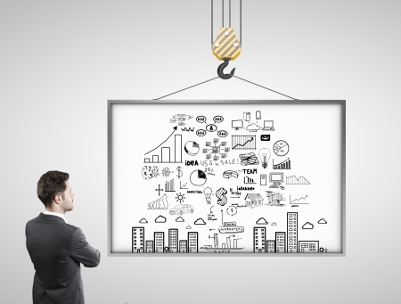 businessman looking at billboard with business  conceptの写真素材