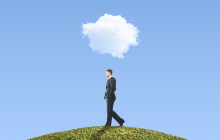 man walking and cloud, business conceptの写真素材