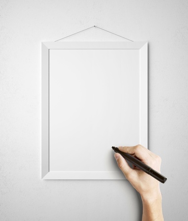 hand drawing in frame on wallの写真素材