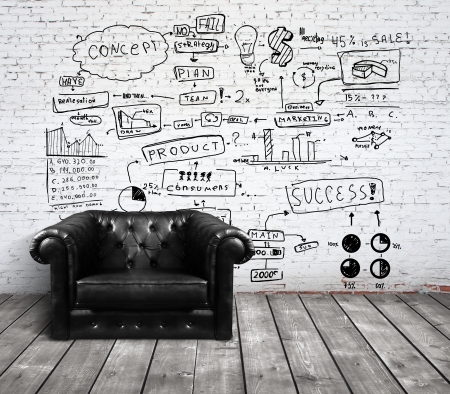 chair in loft with drawing concept on brick wallの写真素材