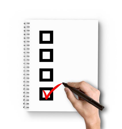 hand drawing checklist on notebookの写真素材