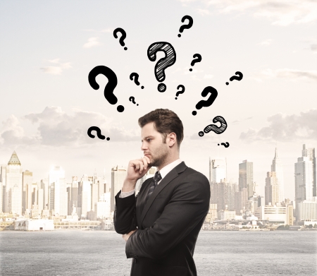 man thinking and city on backgroundの写真素材