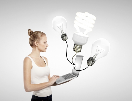 woman with laptop and lamp, idea conceptの写真素材