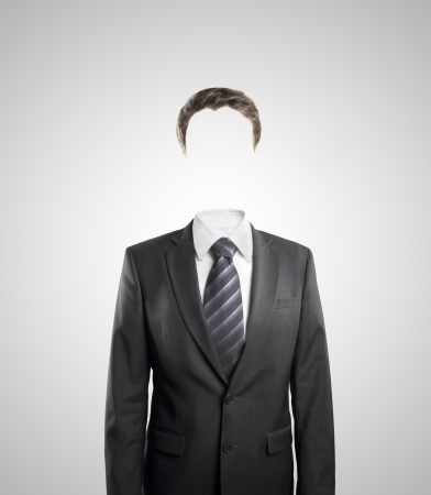 man standing without head  on a white backgroundの写真素材