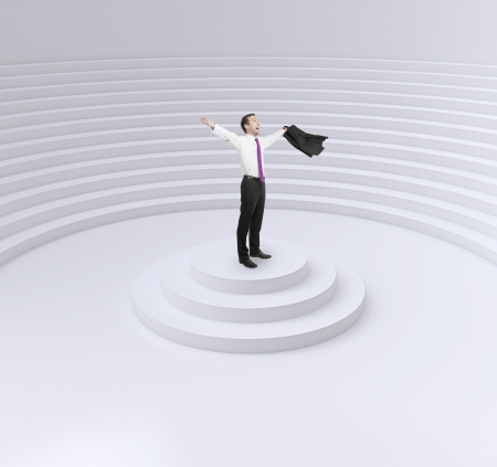 happy businessman standing on a podium in circle auditoriumの写真素材