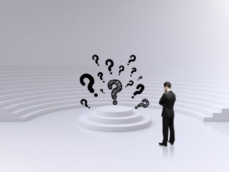 businessman thinking in big circle roomの写真素材
