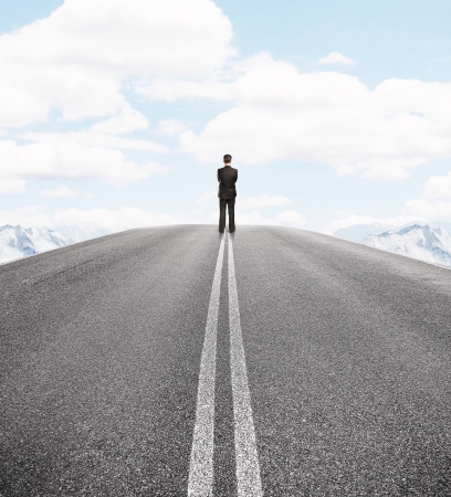 businessman standing on the roadの写真素材