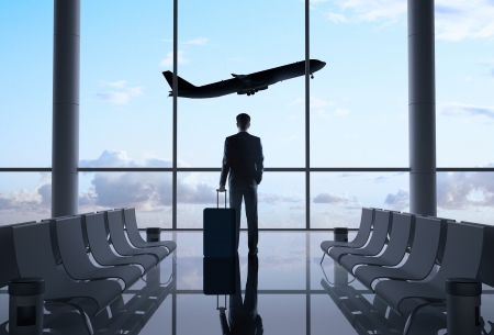 man in airport and airplane in skyの写真素材