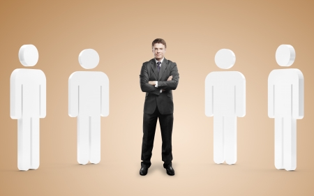 businessman among 3d people on orange backgroundの写真素材