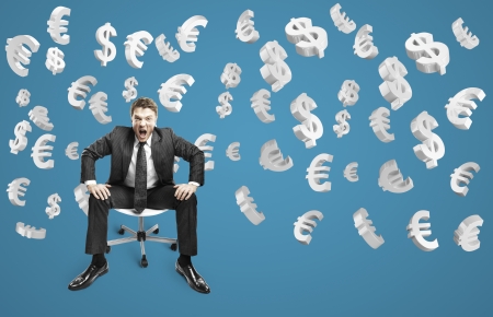 man sitting on chair and screaming with falling dollars and eurosの写真素材