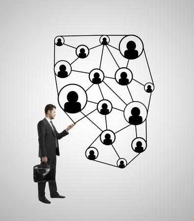 man standing with phone and social mediaの写真素材