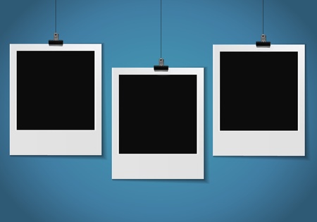 three blank photo pinned on blue wallのイラスト素材