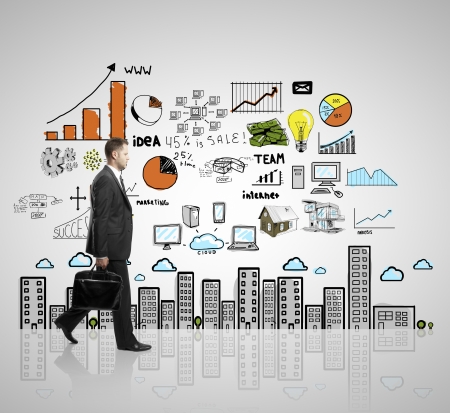 walking businessman with briefcase and business strategyの写真素材
