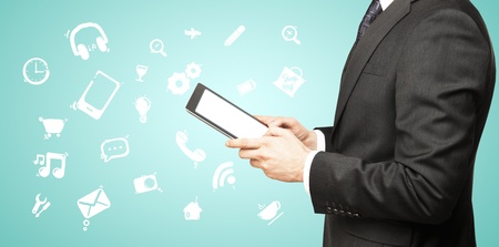 man holding tablet with social iconsの写真素材