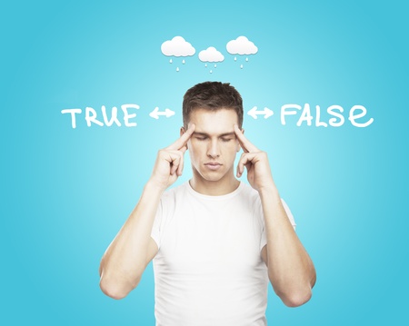 boy thinking, true or falseの写真素材