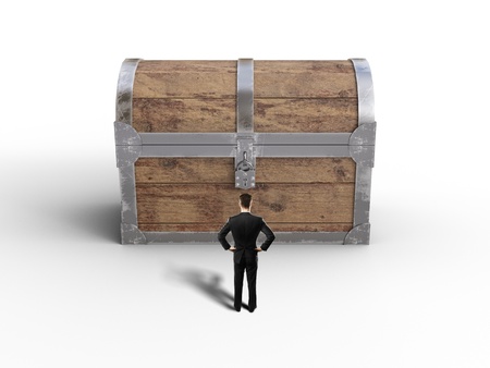 businessman looking at old antique chest on white backgroundの写真素材