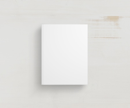 white book on a wooden tableの写真素材