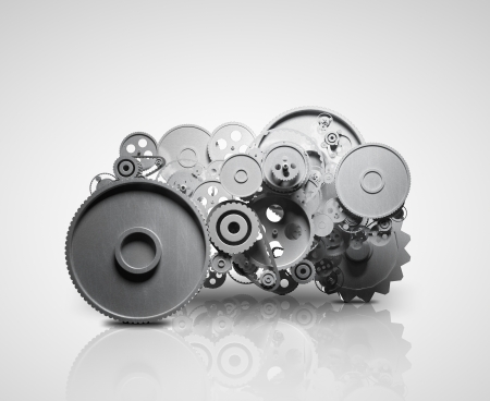 gears and cogwheels oh gray backgroundの写真素材