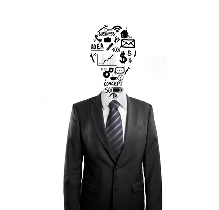 man with  business symbols in form of lamp headの写真素材