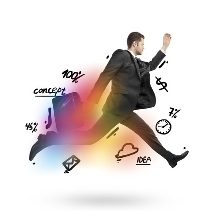 young businessman with briefcase jumpingの写真素材