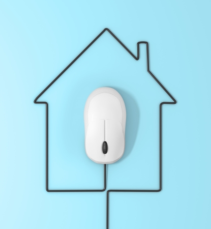 mouse and cables in form of house on a blue backgroundの写真素材