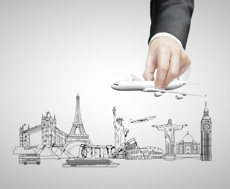 hand holding airplane, travel conceptの写真素材