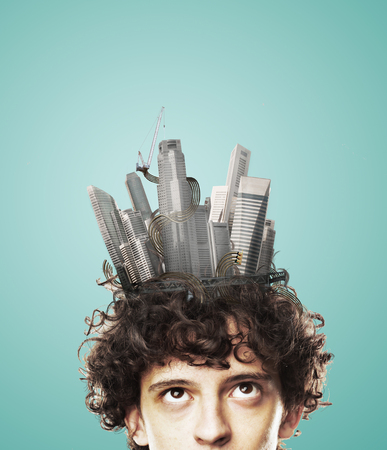 head with skyscrapers on a blue の写真素材