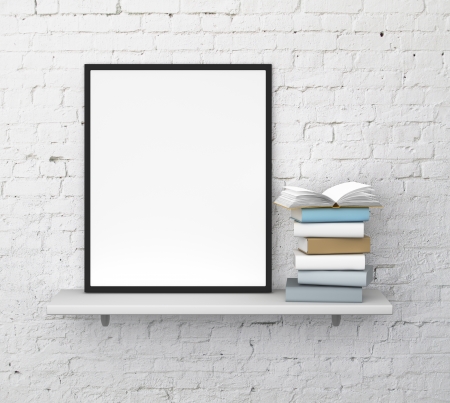 shelf with frame and book on a brick wallの写真素材
