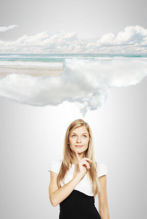 businesswoman thinking at travel on blue backgroundの写真素材