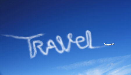 airplane in the sky drawing word travelの写真素材