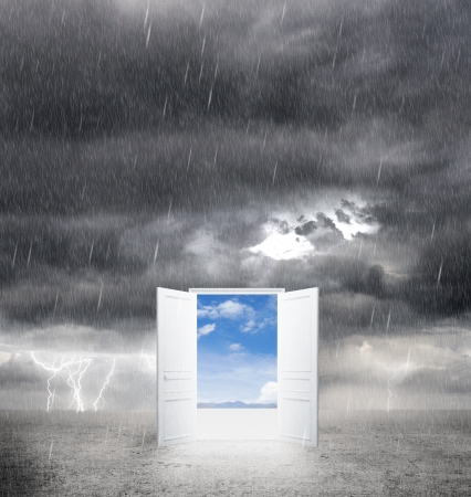 opened door from bad weather to goodの写真素材