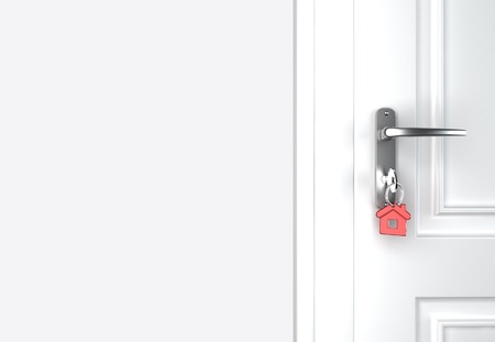 door with key and white wallの写真素材