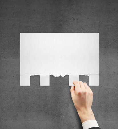 hand torn paper for ads on a concrete backgroundの写真素材