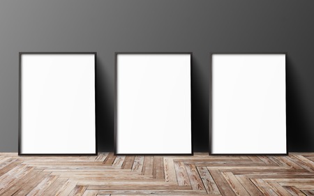 three blank poster hanging on wall