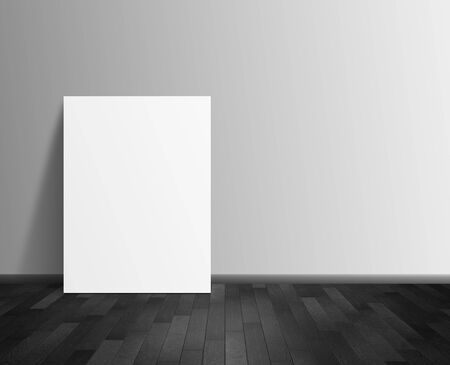 blank poster hanging on wallの写真素材