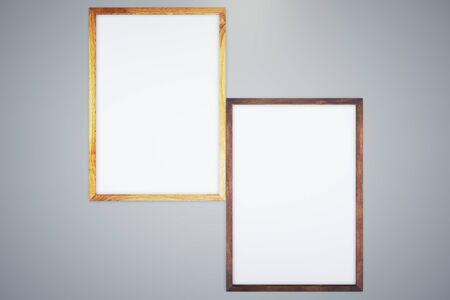 Two blank wooden frames on a gray background. Mock up, 3D Render