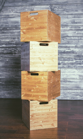 Stack of  boxes on antique wooden background