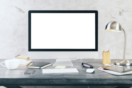 Creative desktop with blank white computer screen and other itmes. Mock upの写真素材